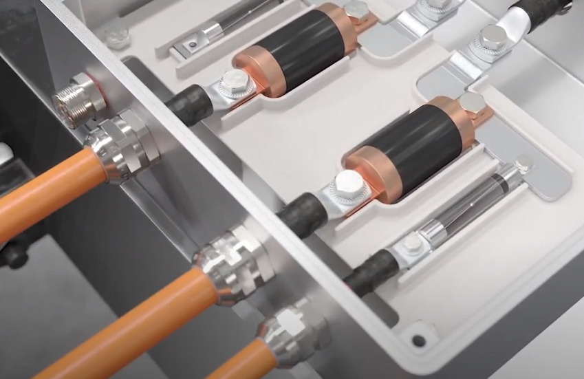 cable glands being used on multiple orange cables